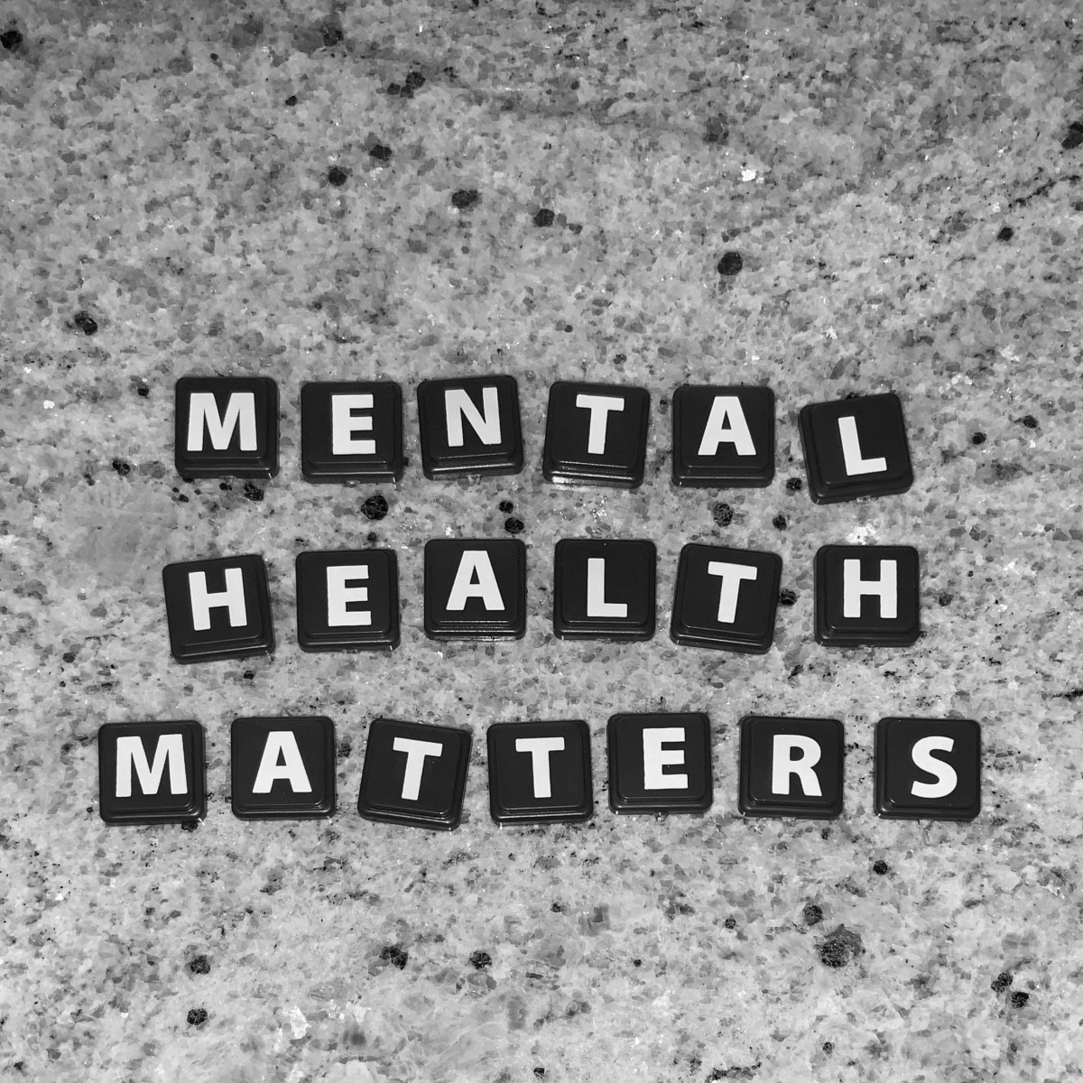 Scrabble tiles spelling 'Mental Health Matters'