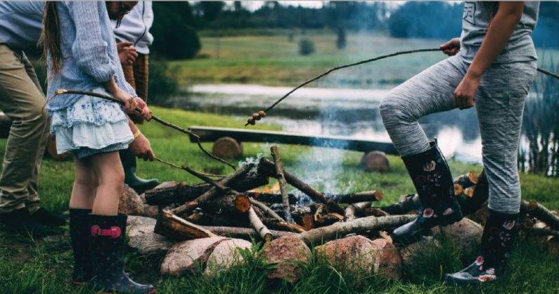 Roasting marshmallows on a campfire