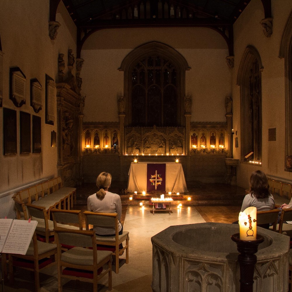 Inside a candle lit chapel